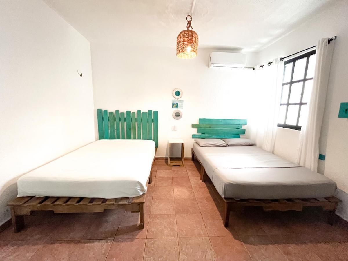 Casa Calido Hotel โกซูเมล ภายนอก รูปภาพ
