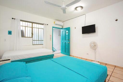Casa Calido Hotel โกซูเมล ภายนอก รูปภาพ